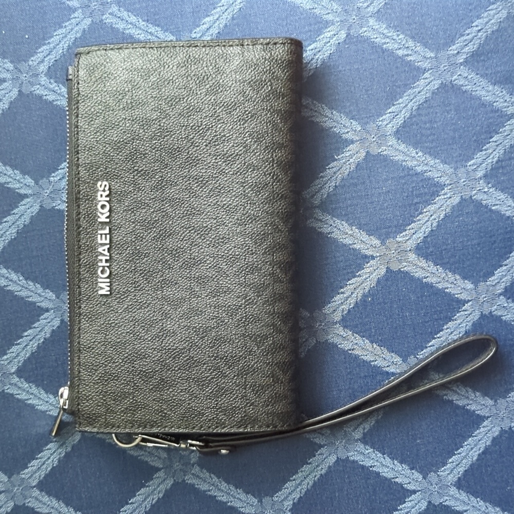 Michael kors wristlet, gently used, black and gray MK detail